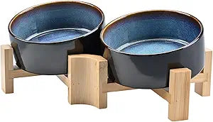 SPUNKYJUNKY 15Â° Slanted Ceramic Dog and Cat Bowl with Wooden Stand, Tilted Bulldog Food and Water Bowl No Slip Non-Spill for Cats Medium Dogs Big Face Pets 13.5 OZ (1.7 Cups, Starry Blue Ã— 2)